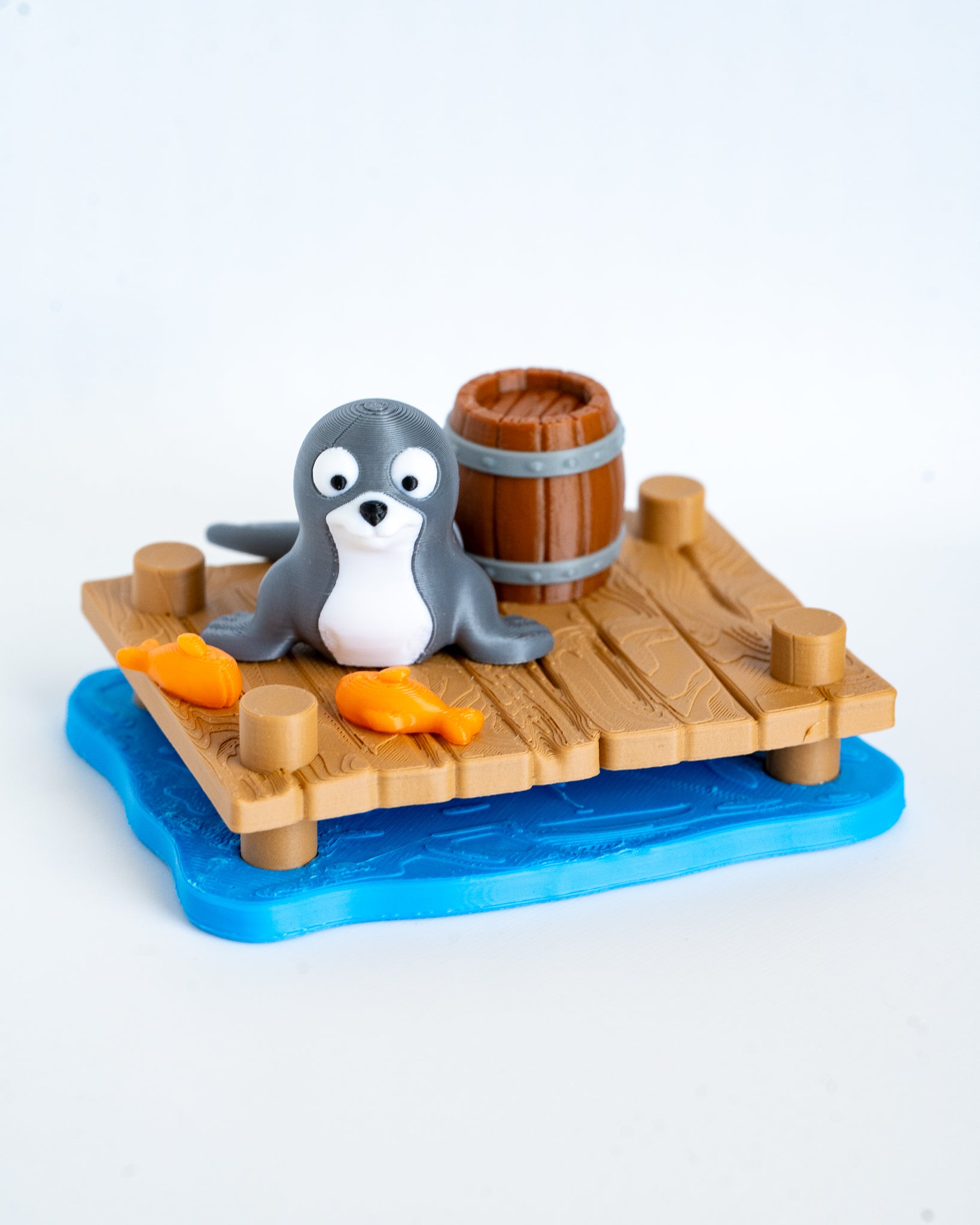 Seal decorative scene with dock display base