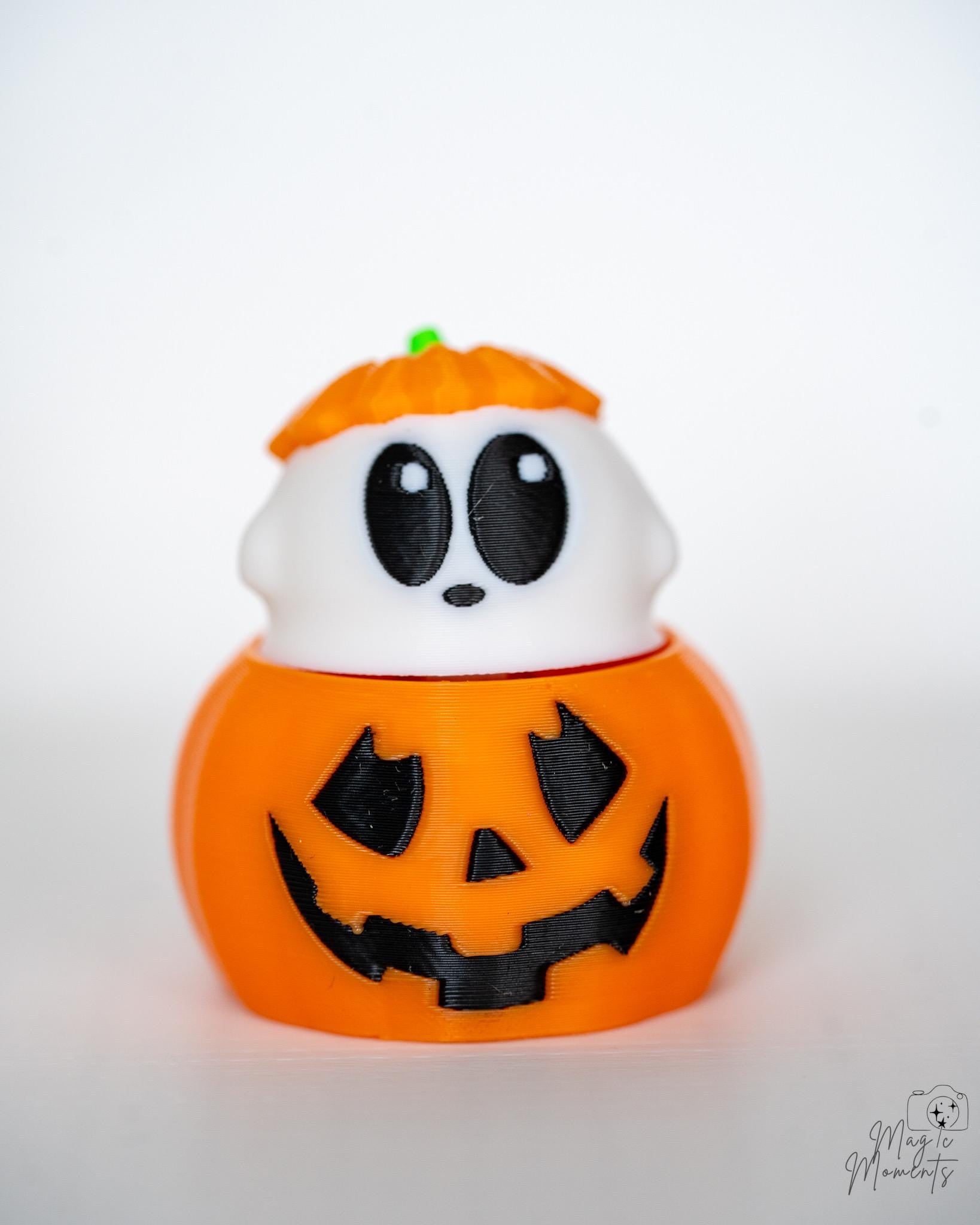 Pumpkin ghost clickers with jack o lantern faces