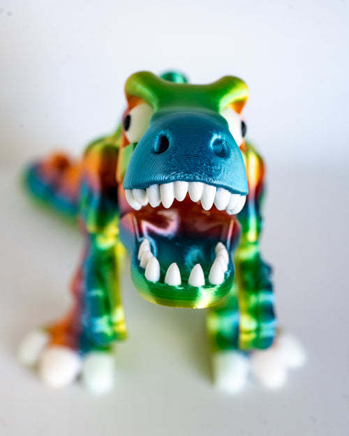 Colourful T-Rex skeleton figure in rainbow filament