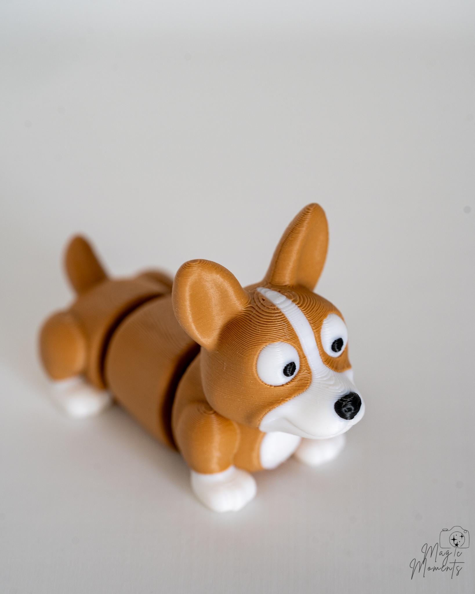 corgi articulated puppy figure with flexible body design