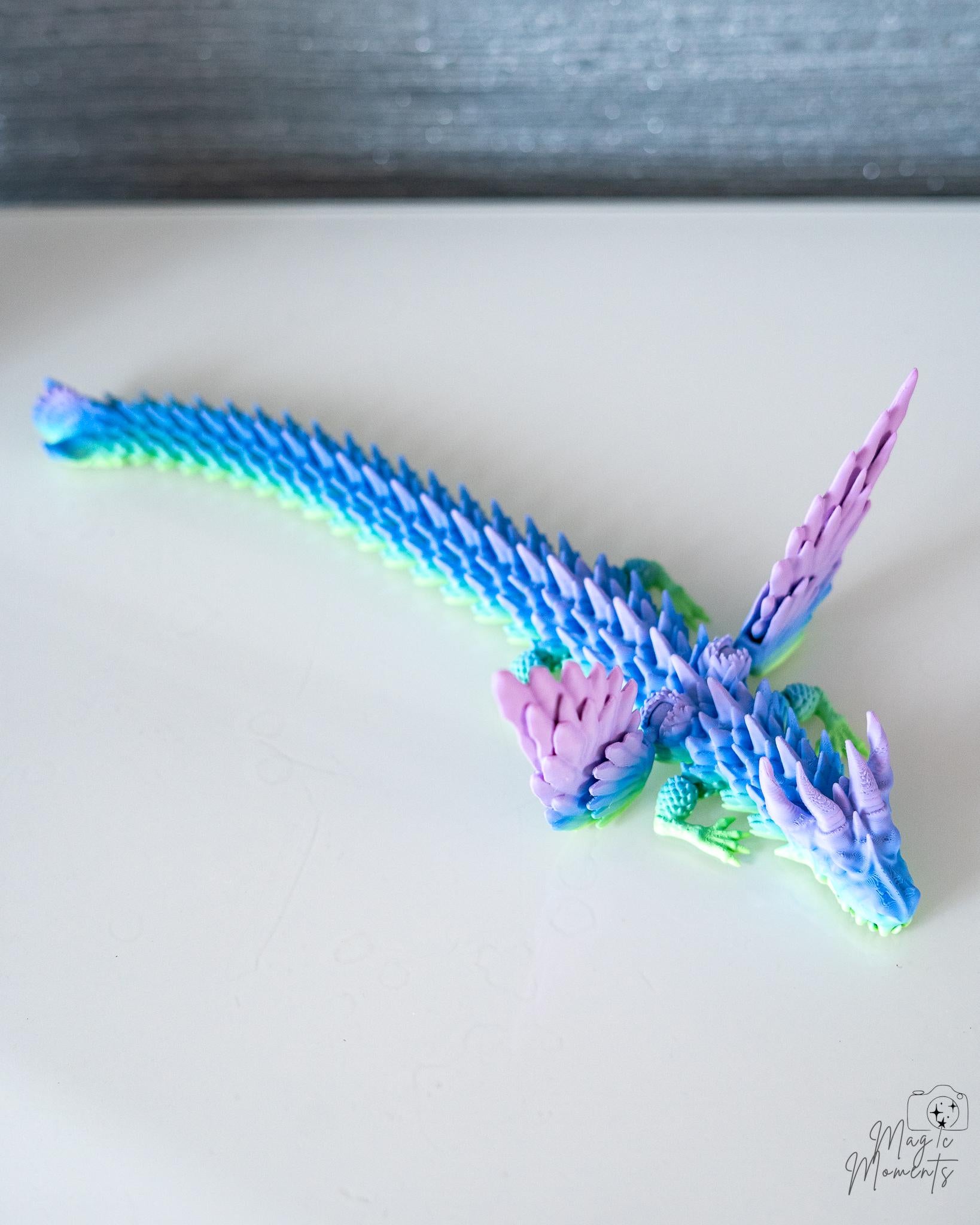 Pastel rainbow dragon with movable wings and tail