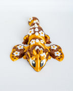 Articulated bee dragon figurine with floral details