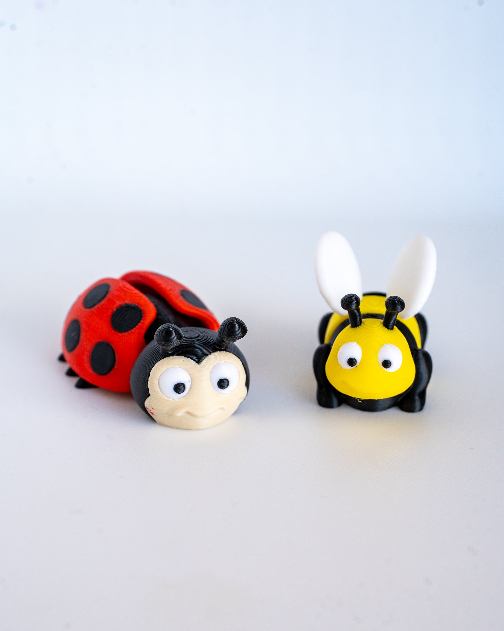 Cute bee and ladybug figurines