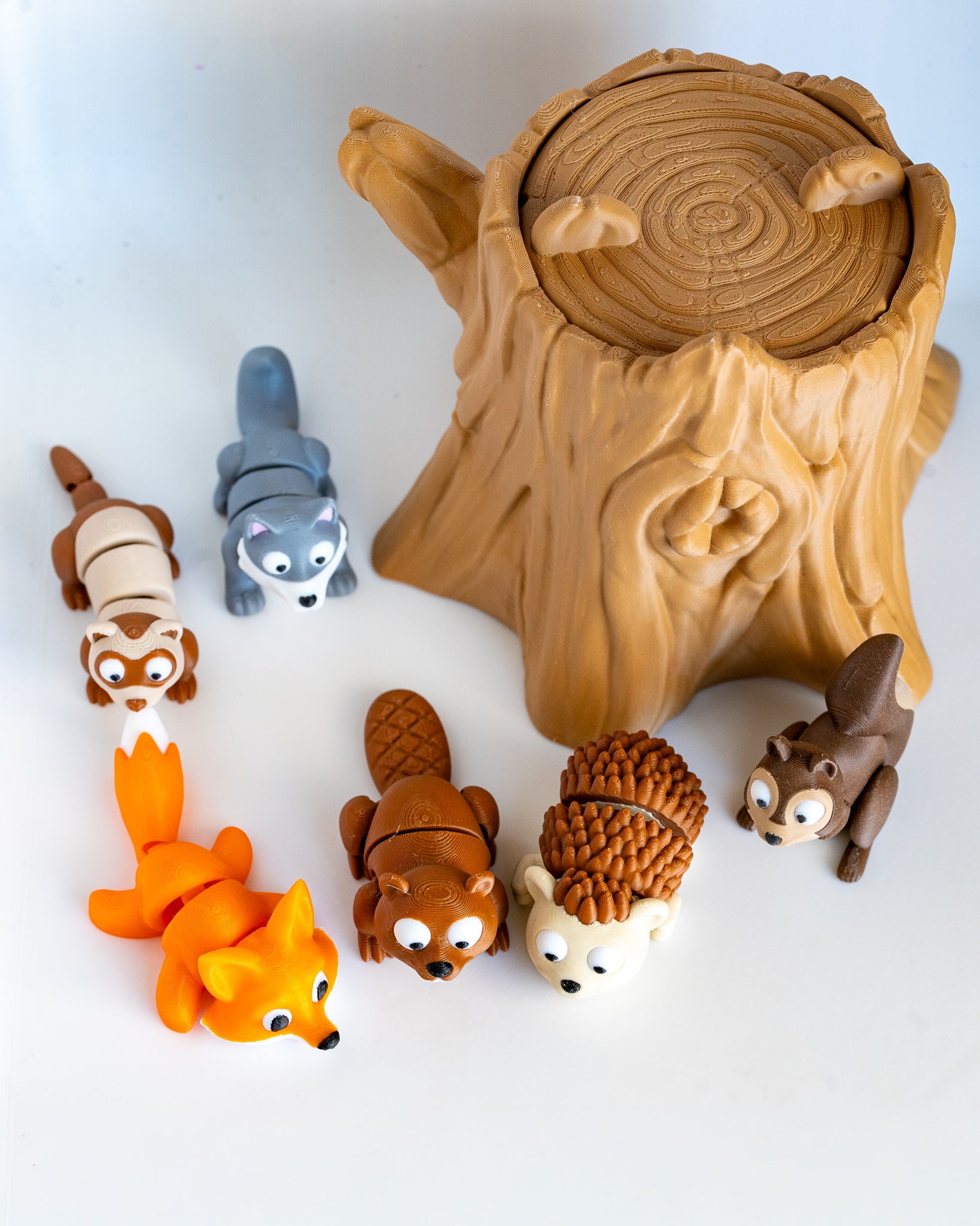 Tree stump decorative container with forest animals