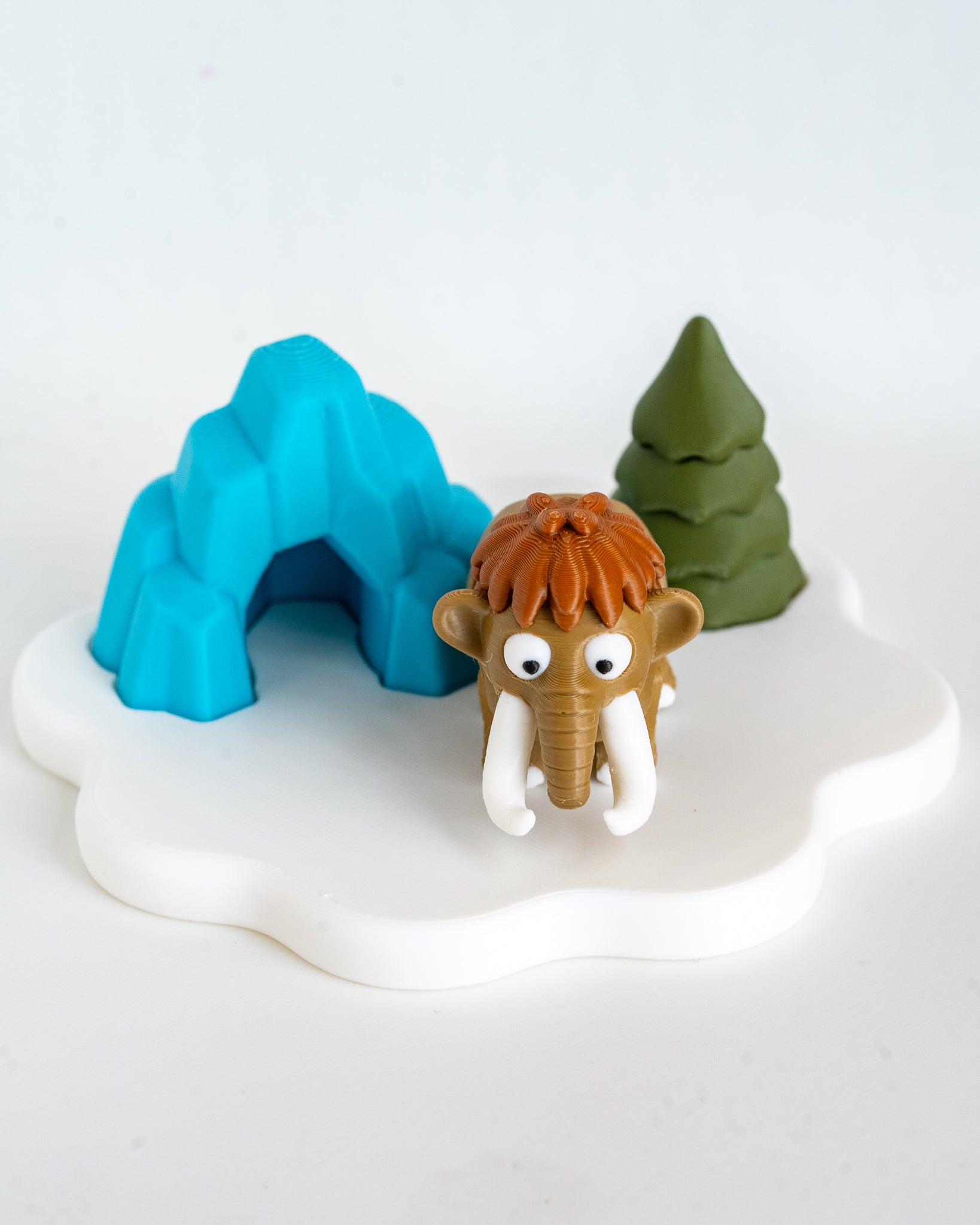 Winter cave display with mammoth figure