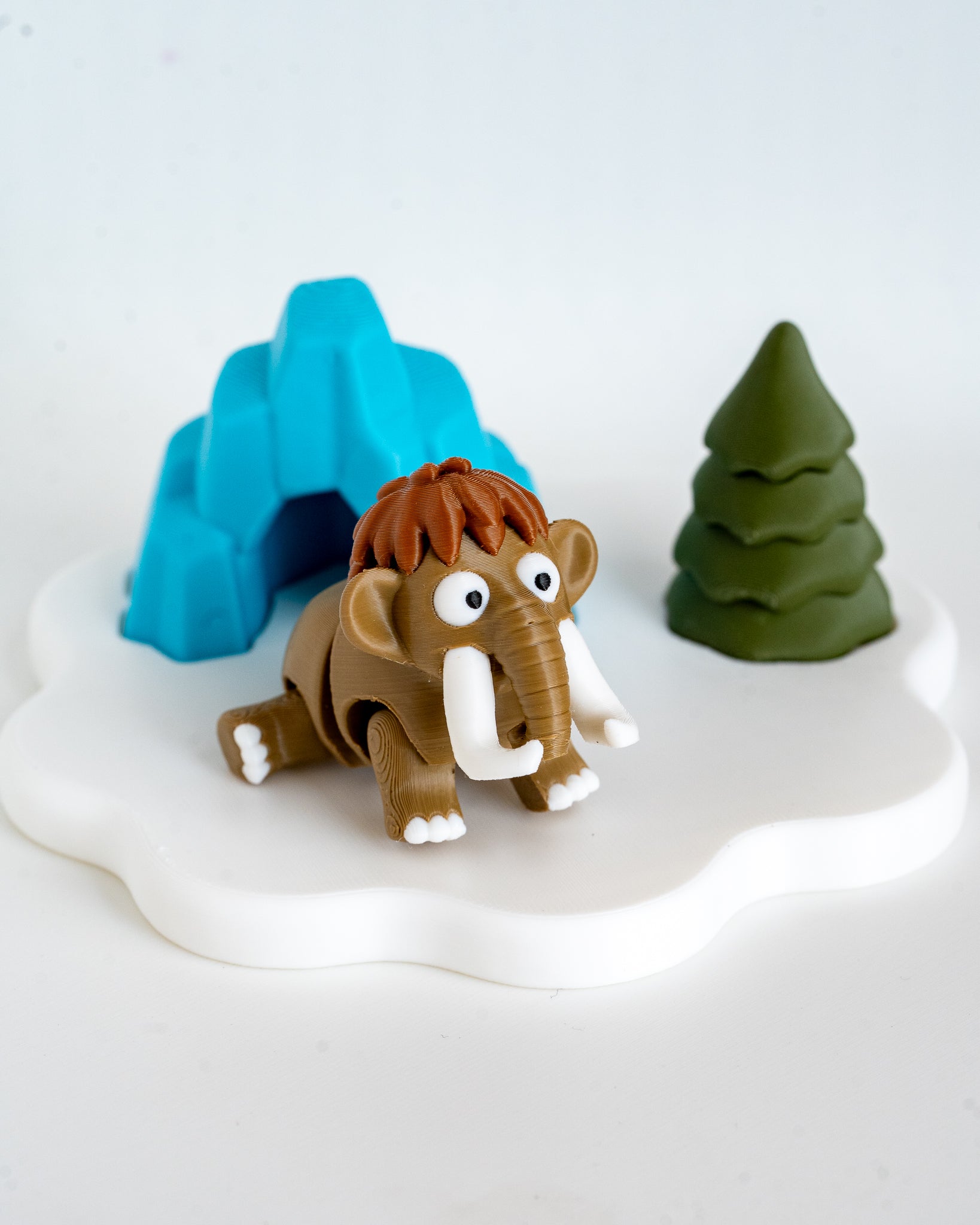 Winter cave display with mammoth figure