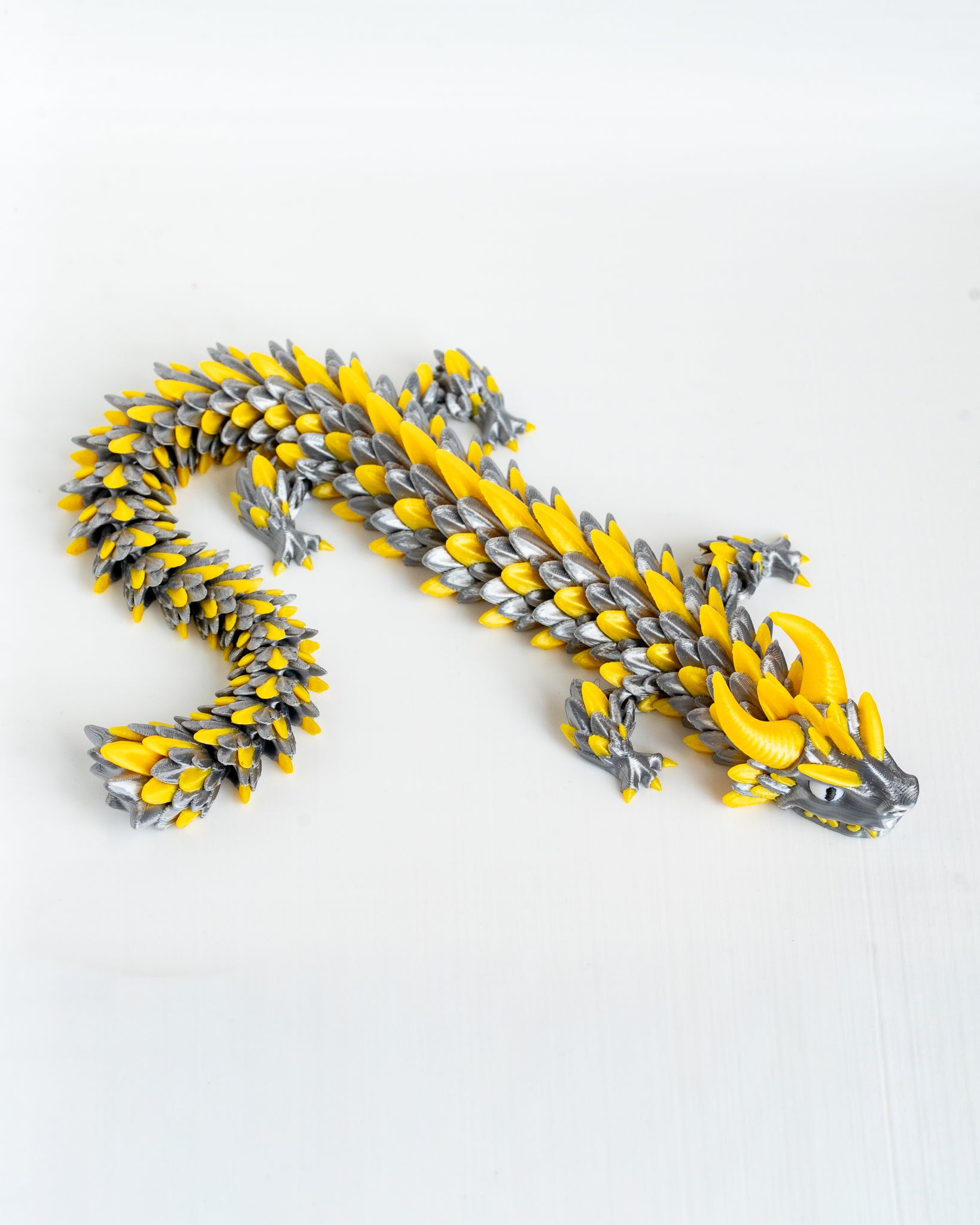 Yellow and silver dragon decorative figure