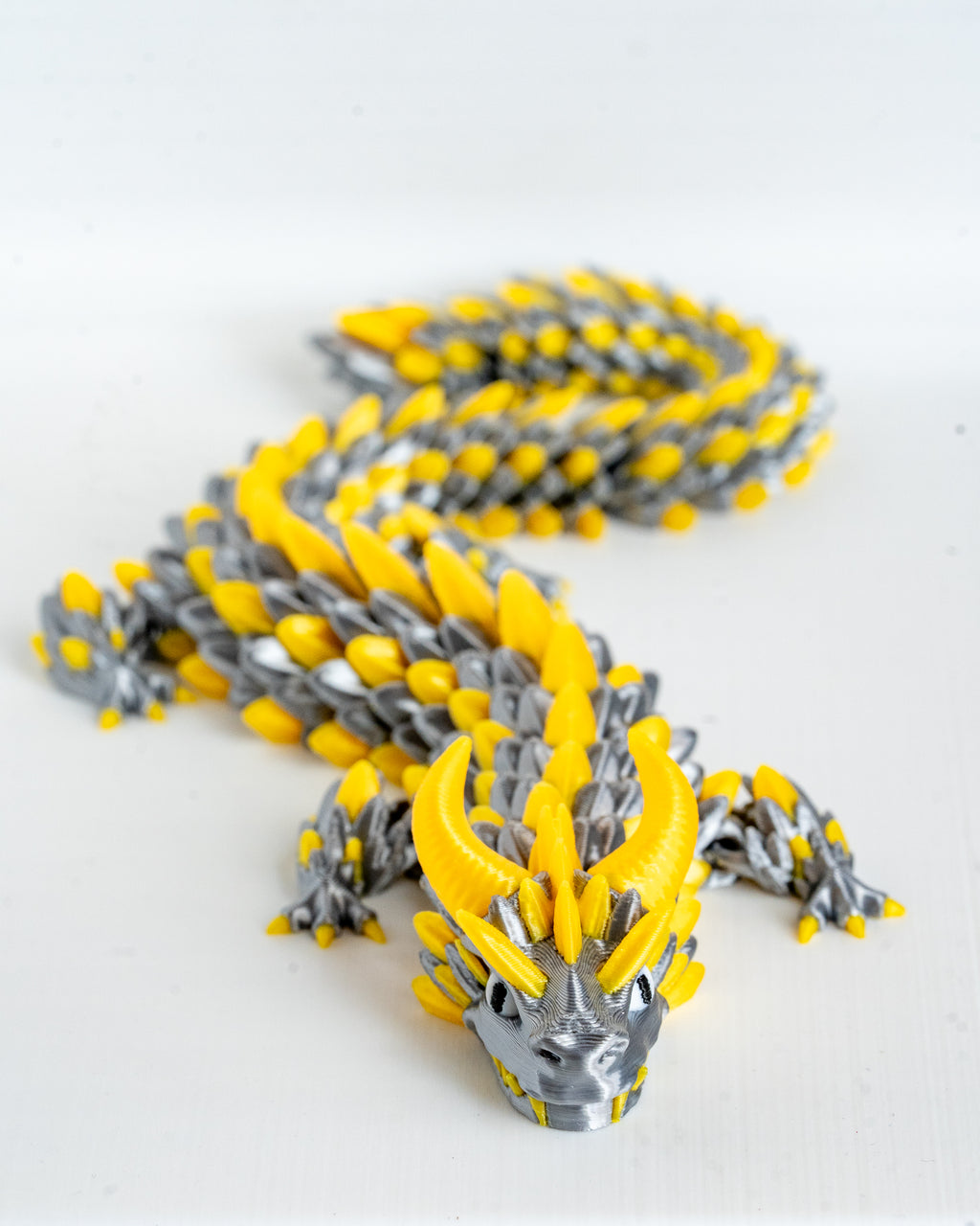 Yellow and silver dragon decorative figure