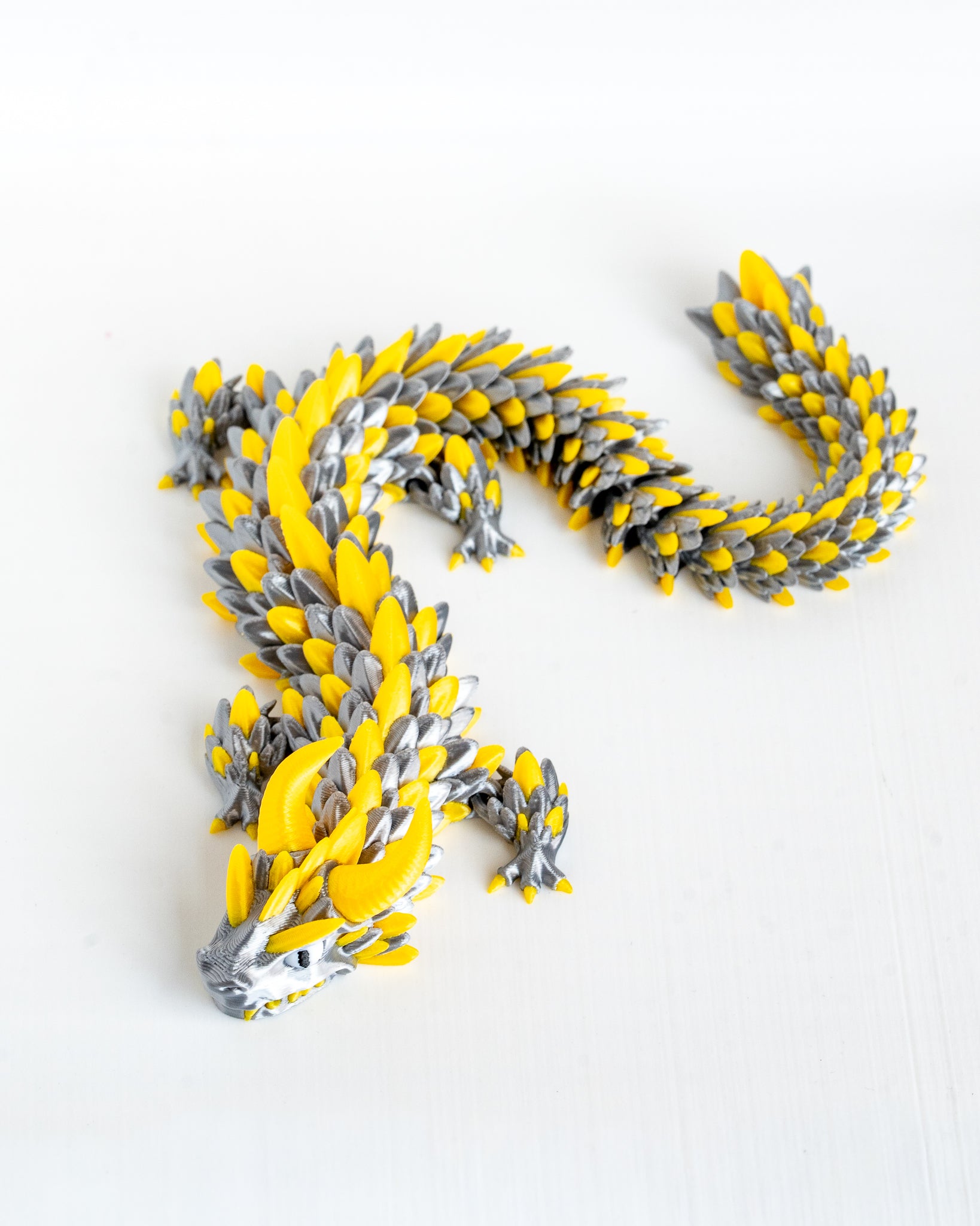 Top view of articulated dragon figure