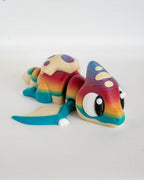 Articulated pterodactyl figurine with rainbow colours