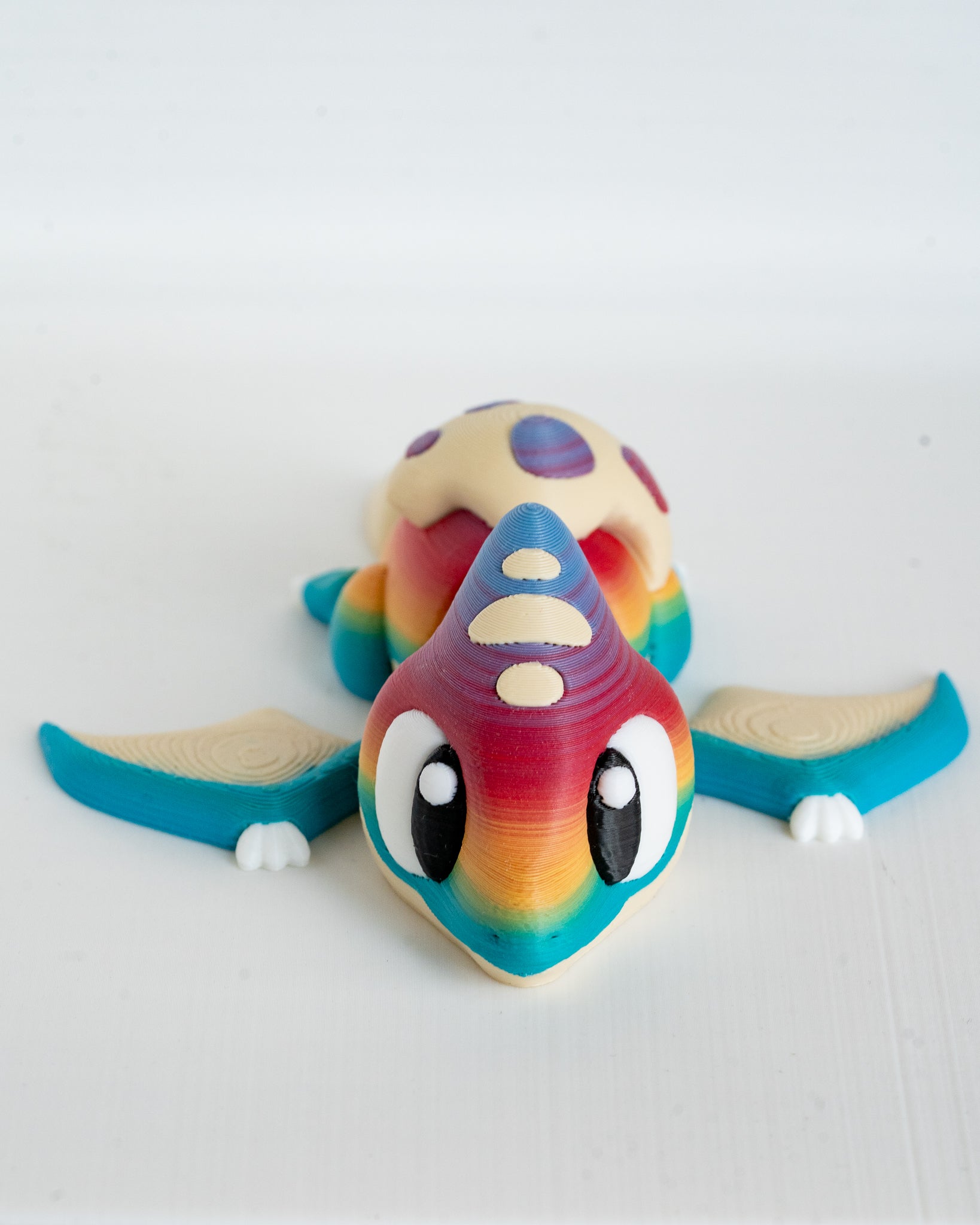 Rainbow pterodactyl viewed from front