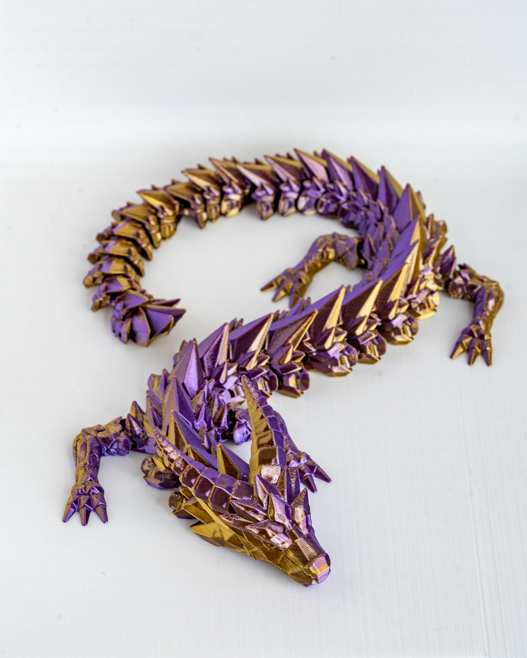 Purple Prismor dragon viewed from angle