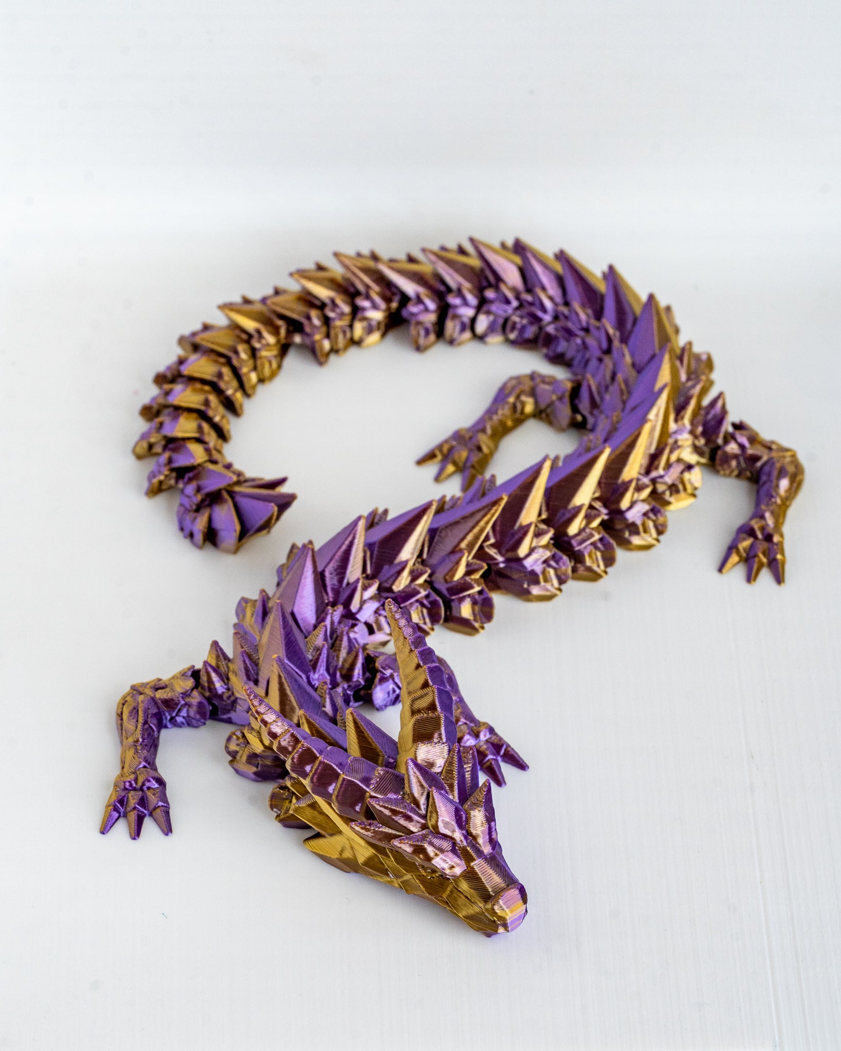 Purple Prismor dragon viewed from angle