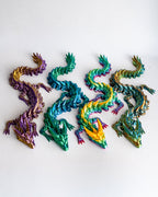 Articulated Prismor dragon figurines in multiple colour styles