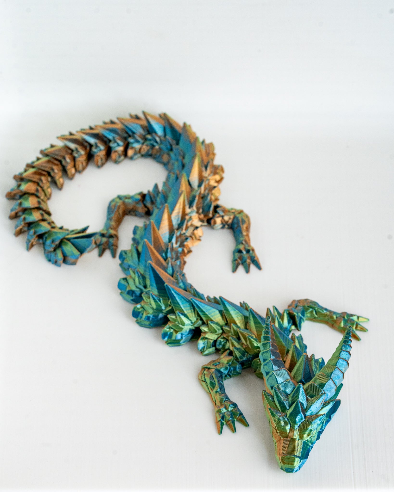 Teal Prismor dragon decorative figure