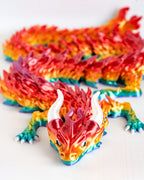 Colorful dragon figurine on a white background