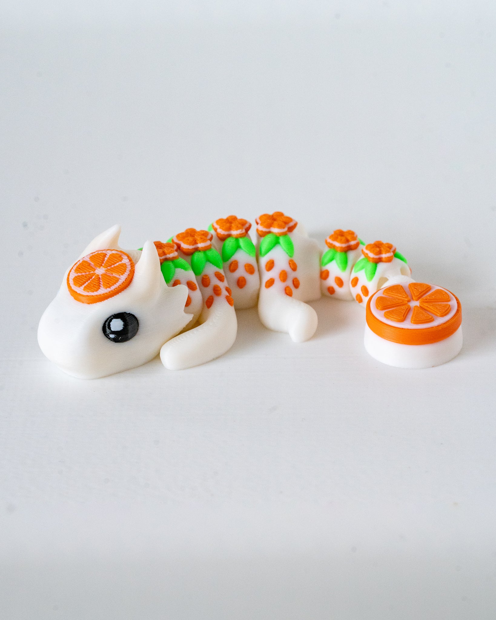 orange dragon figurine