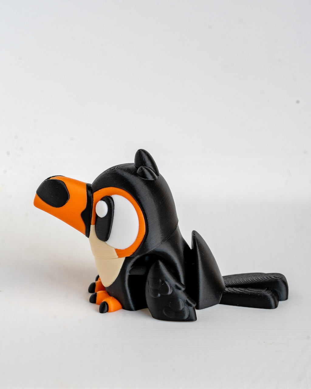toucan figurine 