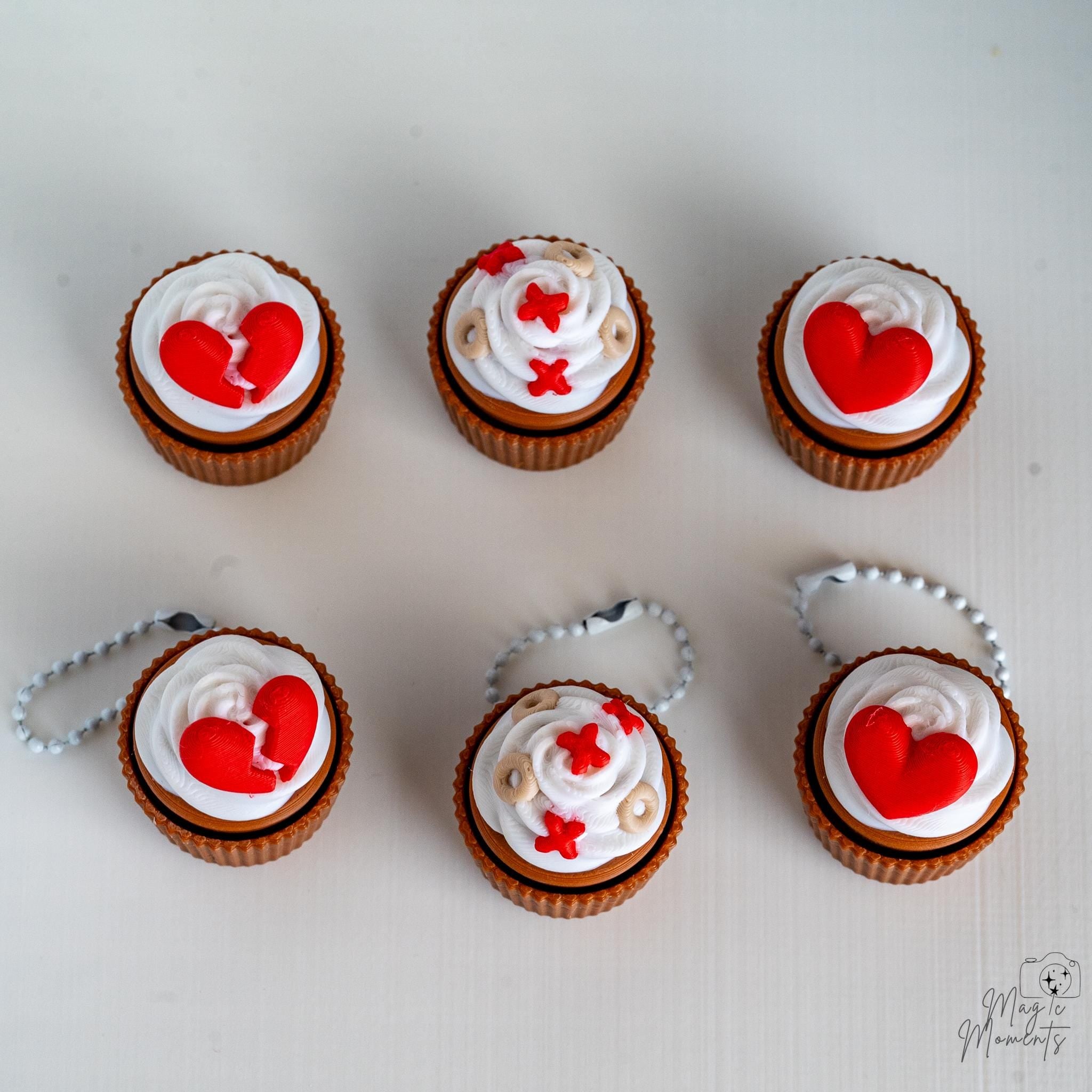 Valentine cupcake clicker collection with heart and frosting decorations