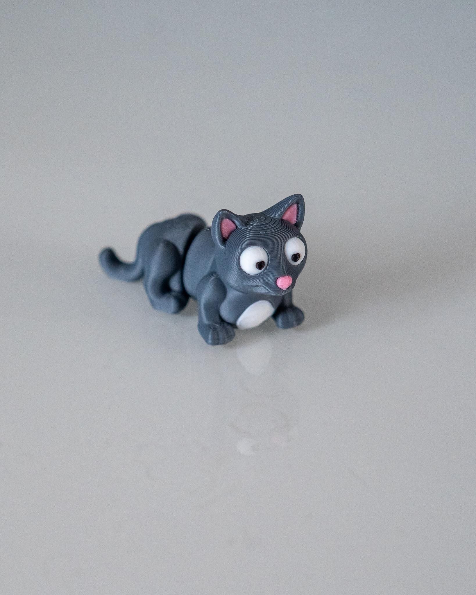 Cute grey cat figure with cartoon facial details