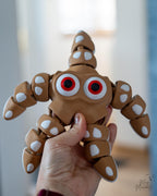 Cute brown starfish figure with cartoon eyes