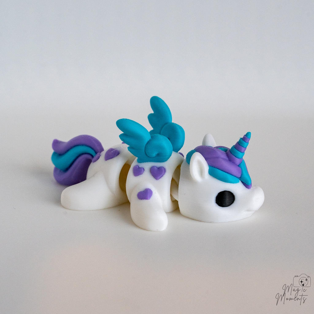 3D printed unicorn decoration with flexible articulated body design