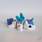 3D printed unicorn decoration with flexible articulated body design