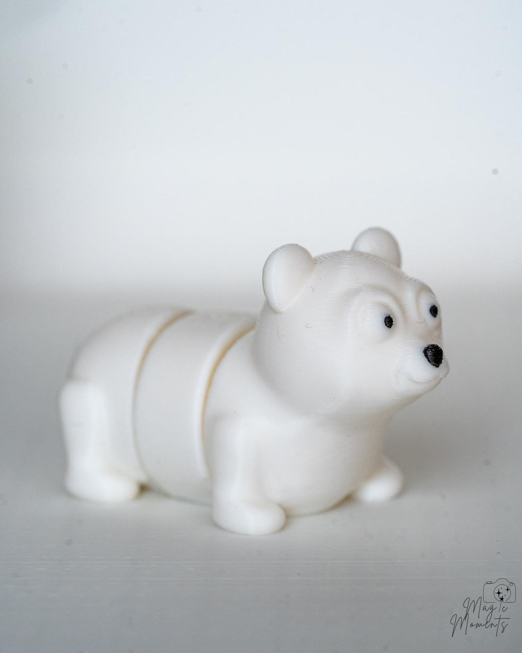 Polar bear figure with articulated segmented body design
