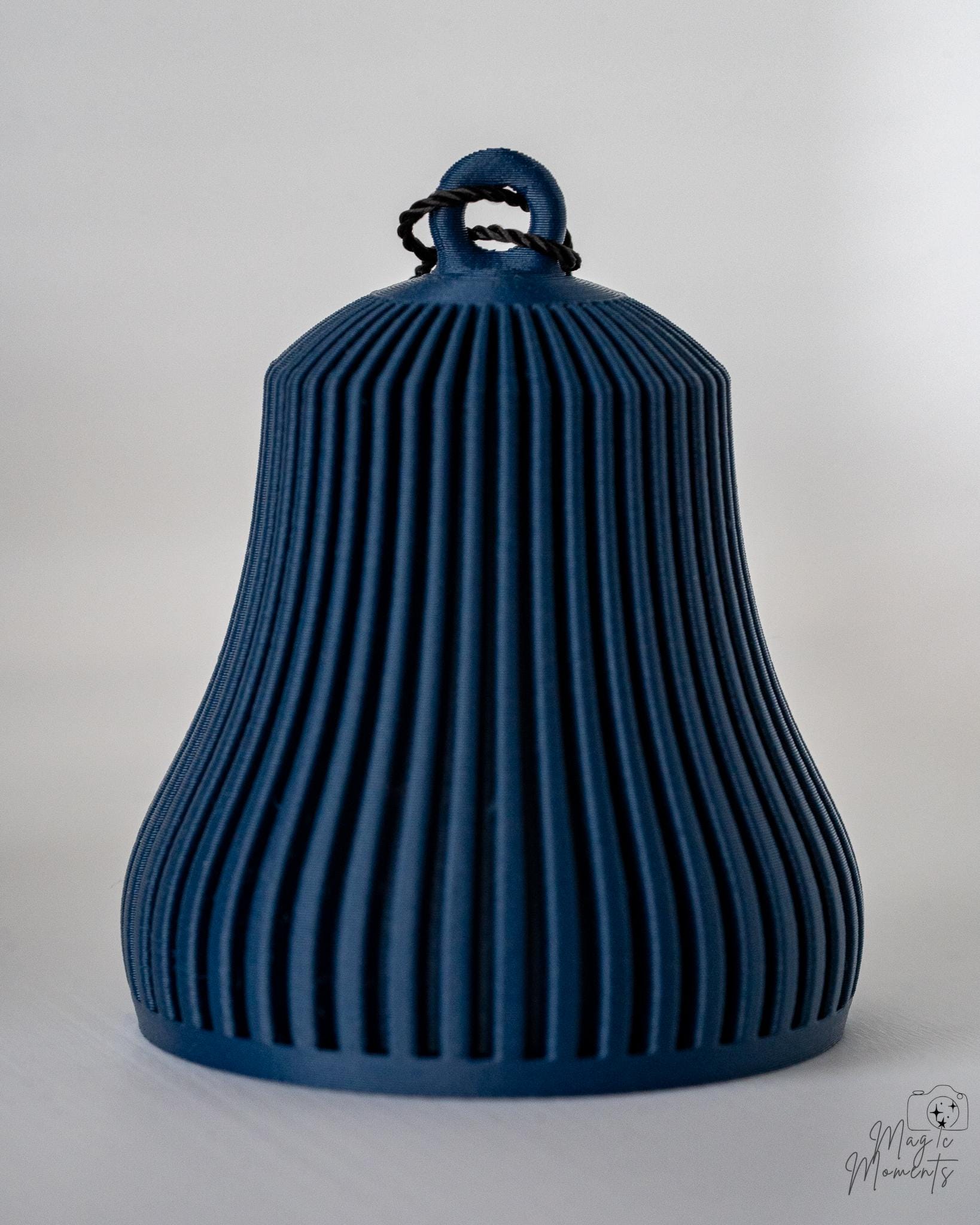 blue ribbed christmas bell ornament