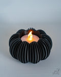 Ribbed pumpkin tealight holder in black colour