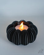 Ribbed pumpkin tealight holder in black colour