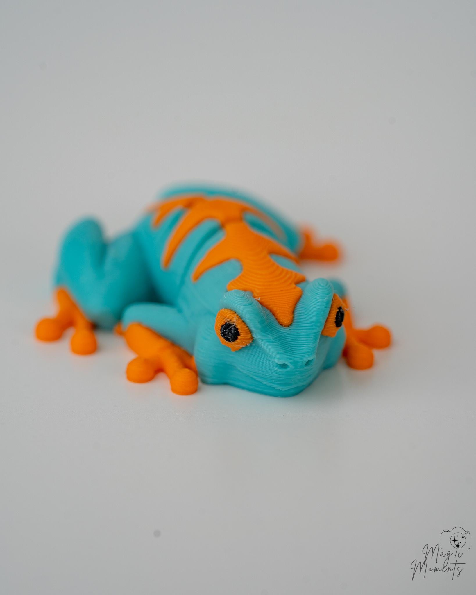 Blue and orange frog figurine 3d printed 