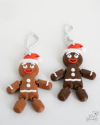 Gingerbread Christmas ornament set with festive Santa hat designs