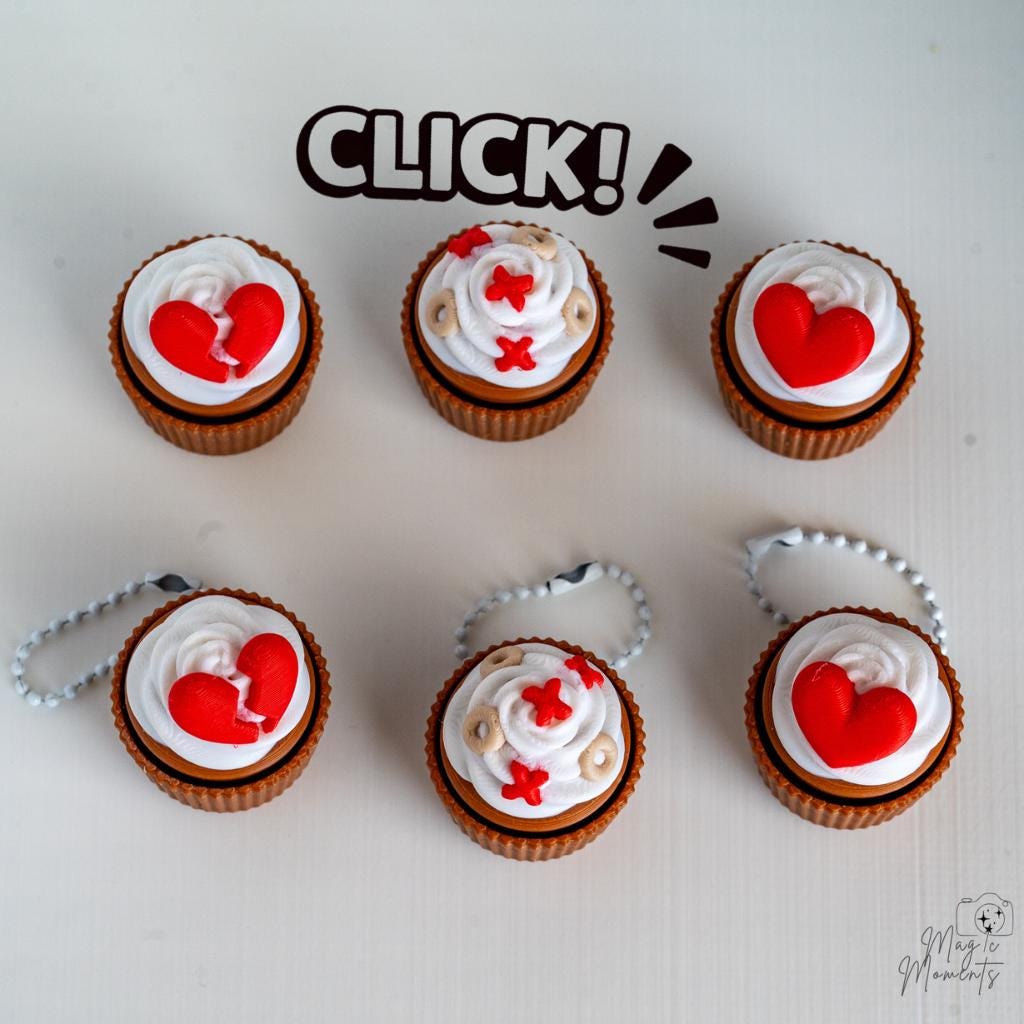 Matching cupcake clicker set with romantic themed toppers