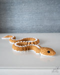 Articulated snake with flexible segmented body