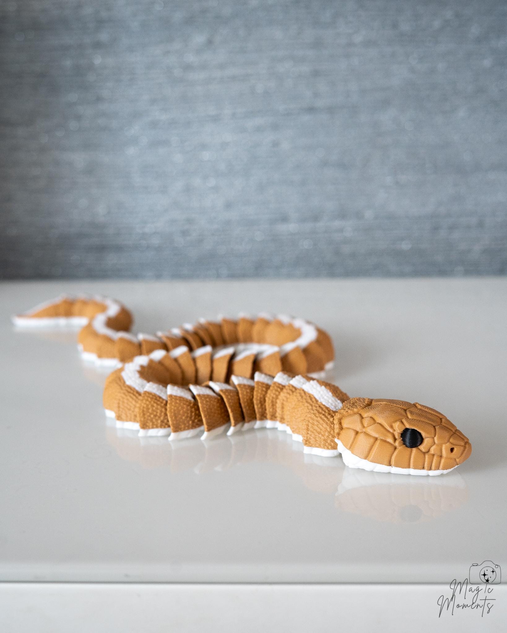 Articulated snake with flexible segmented body