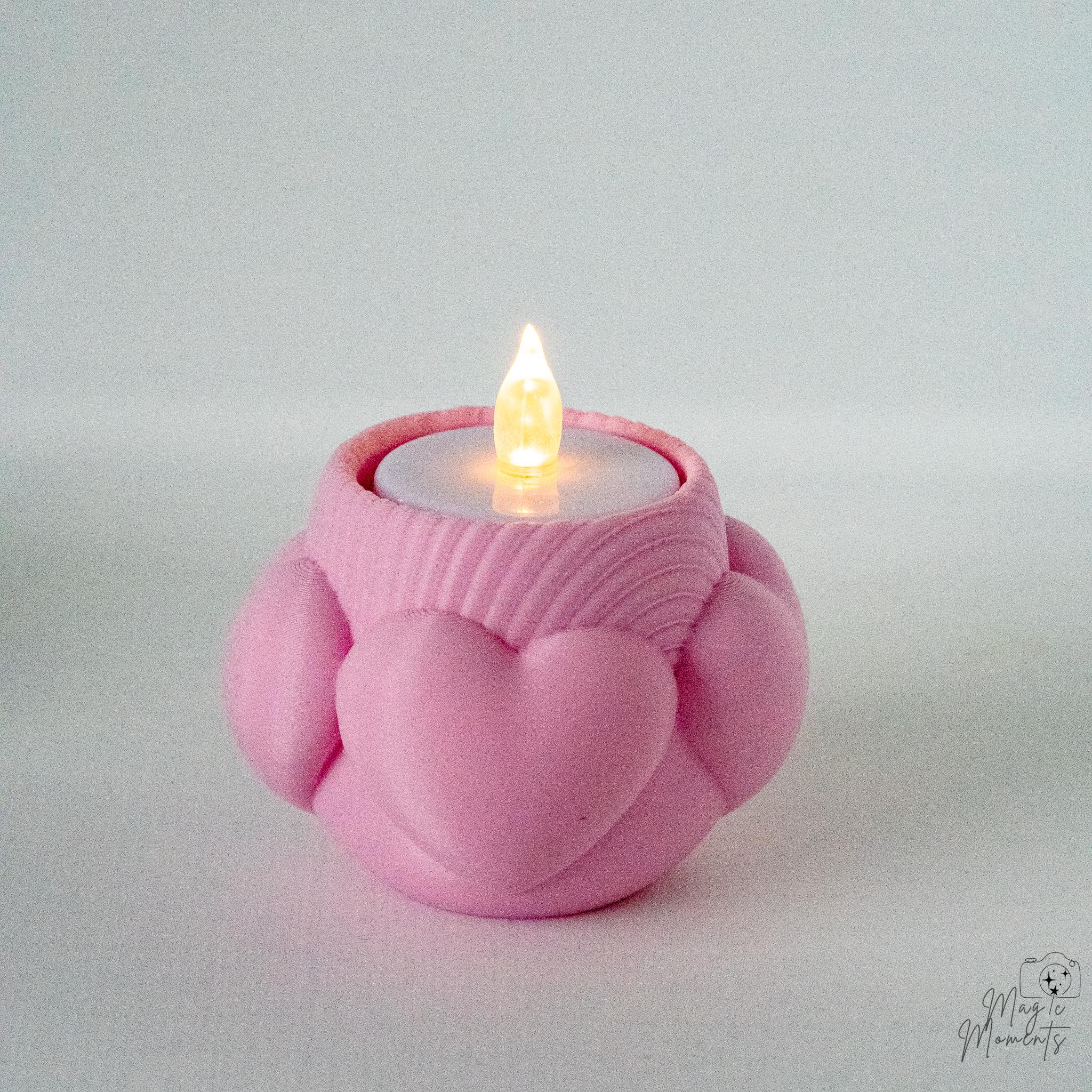 Pink heart tealight holder with layered heart design for LED tealights