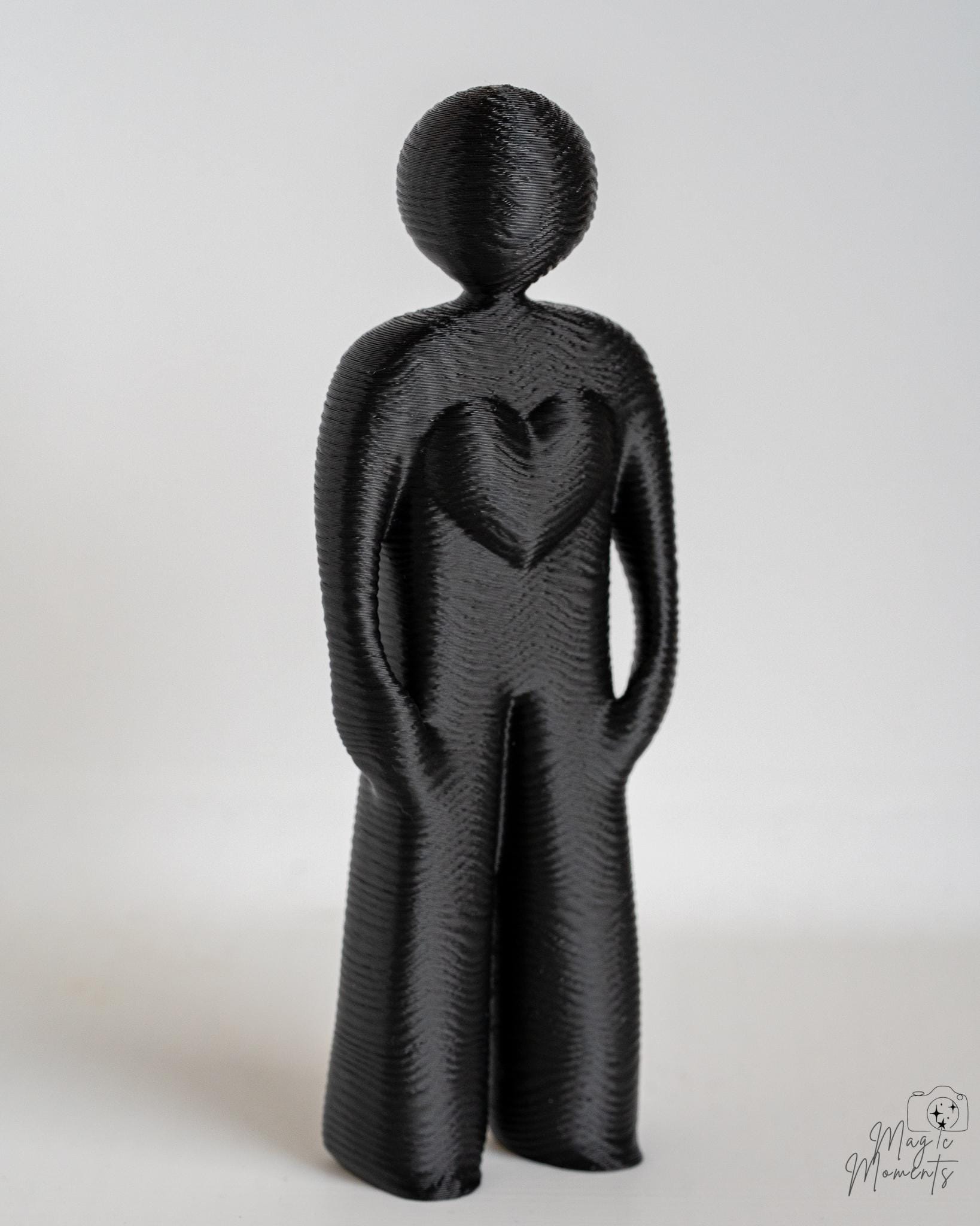 black minimalist human sculpture