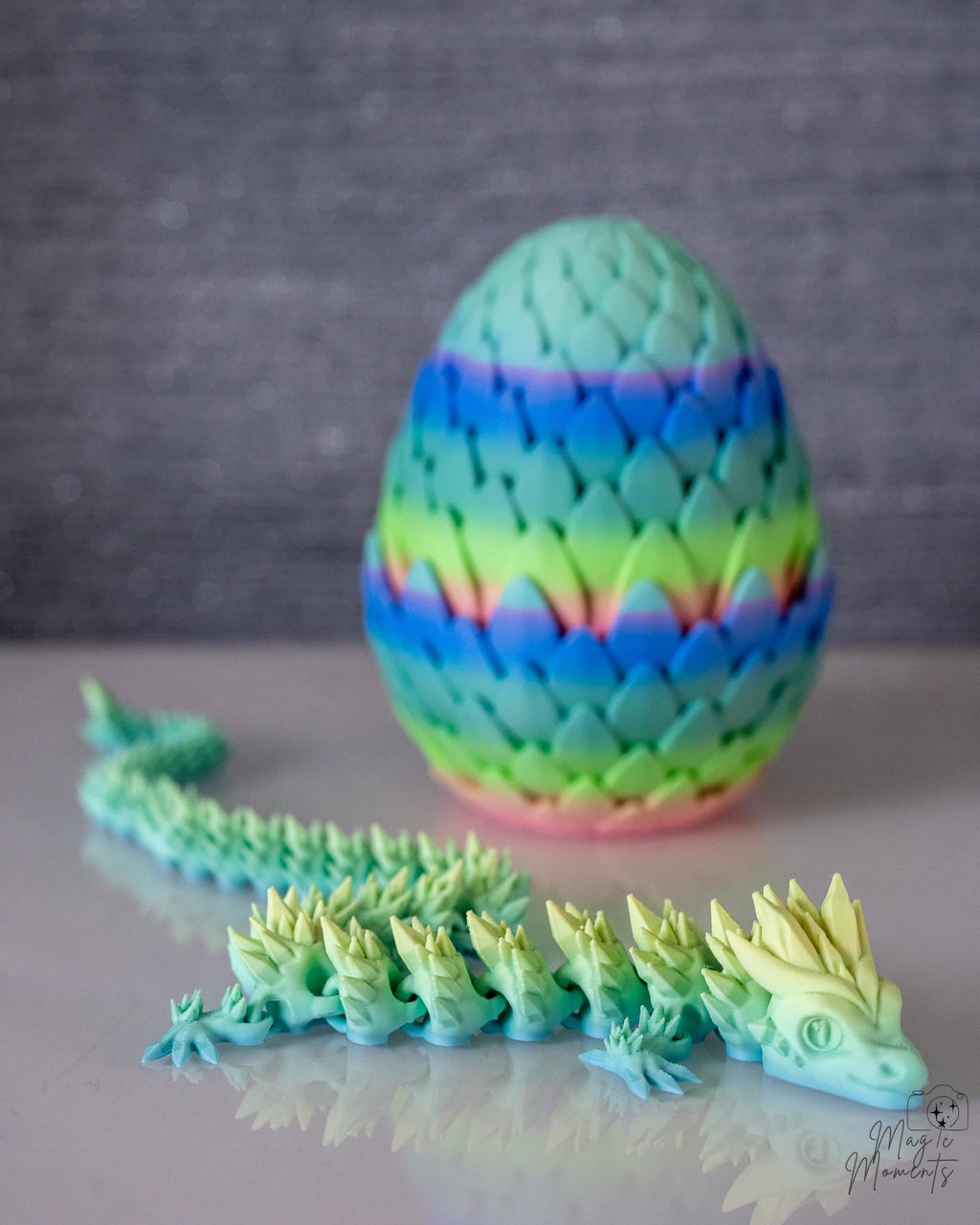 rainbow dragon egg container with articulated dragon