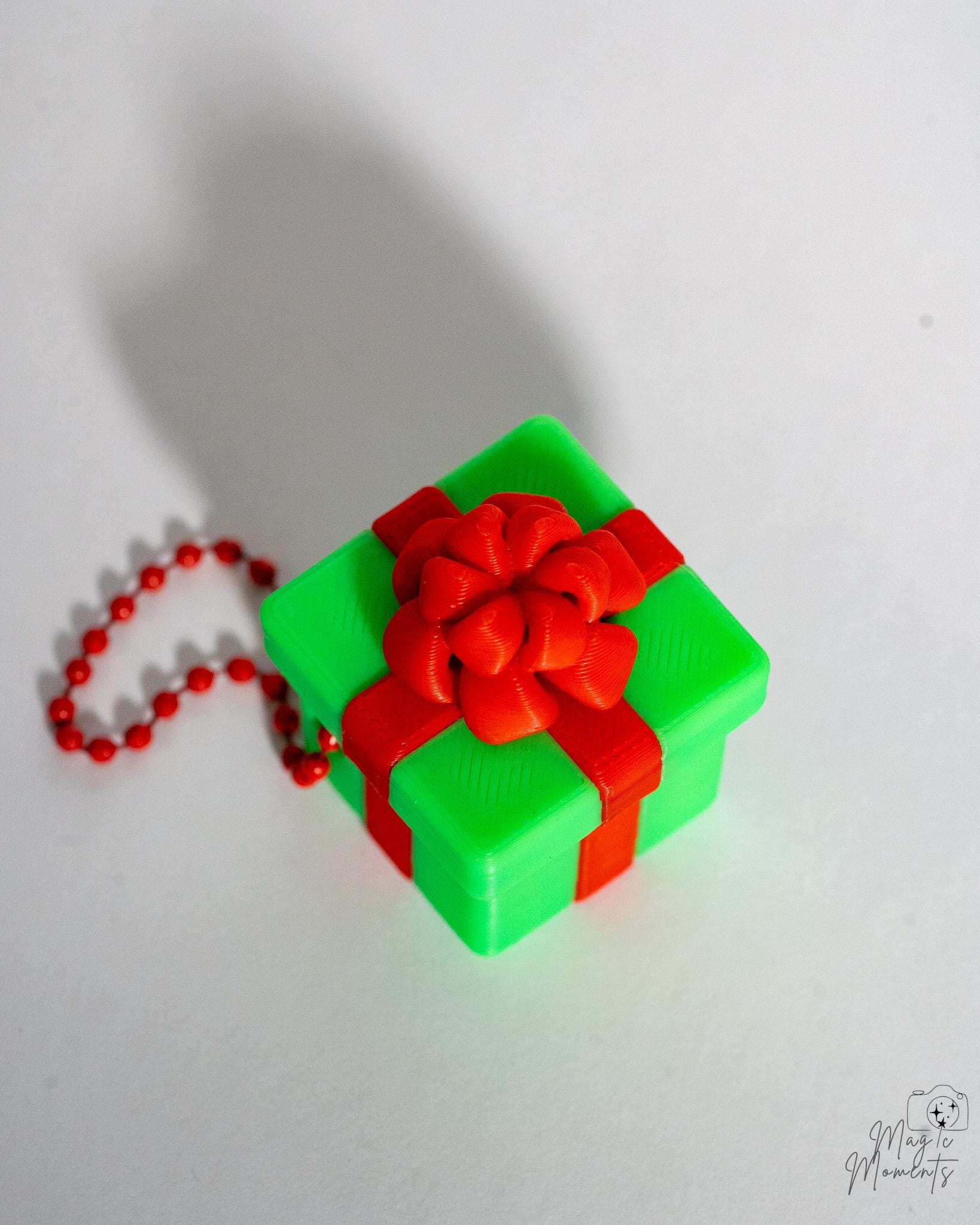 square christmas present clicker keychain
