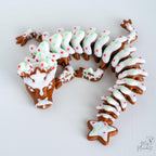 flexible articulated gingerbread dragon curved 3d printed christmas dragon