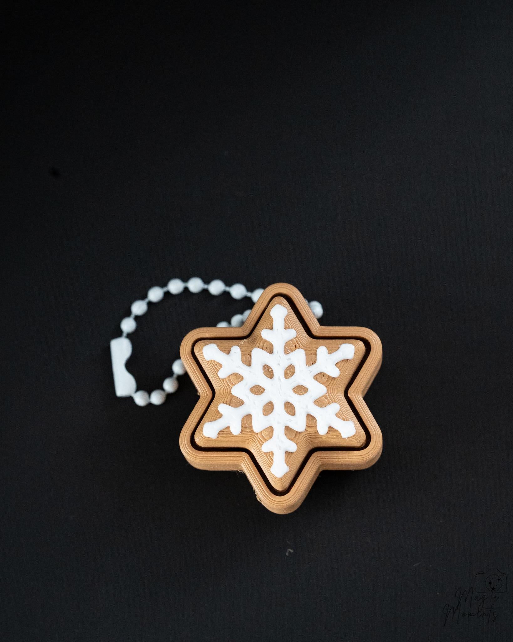gingerbread snowflake clicker ornament