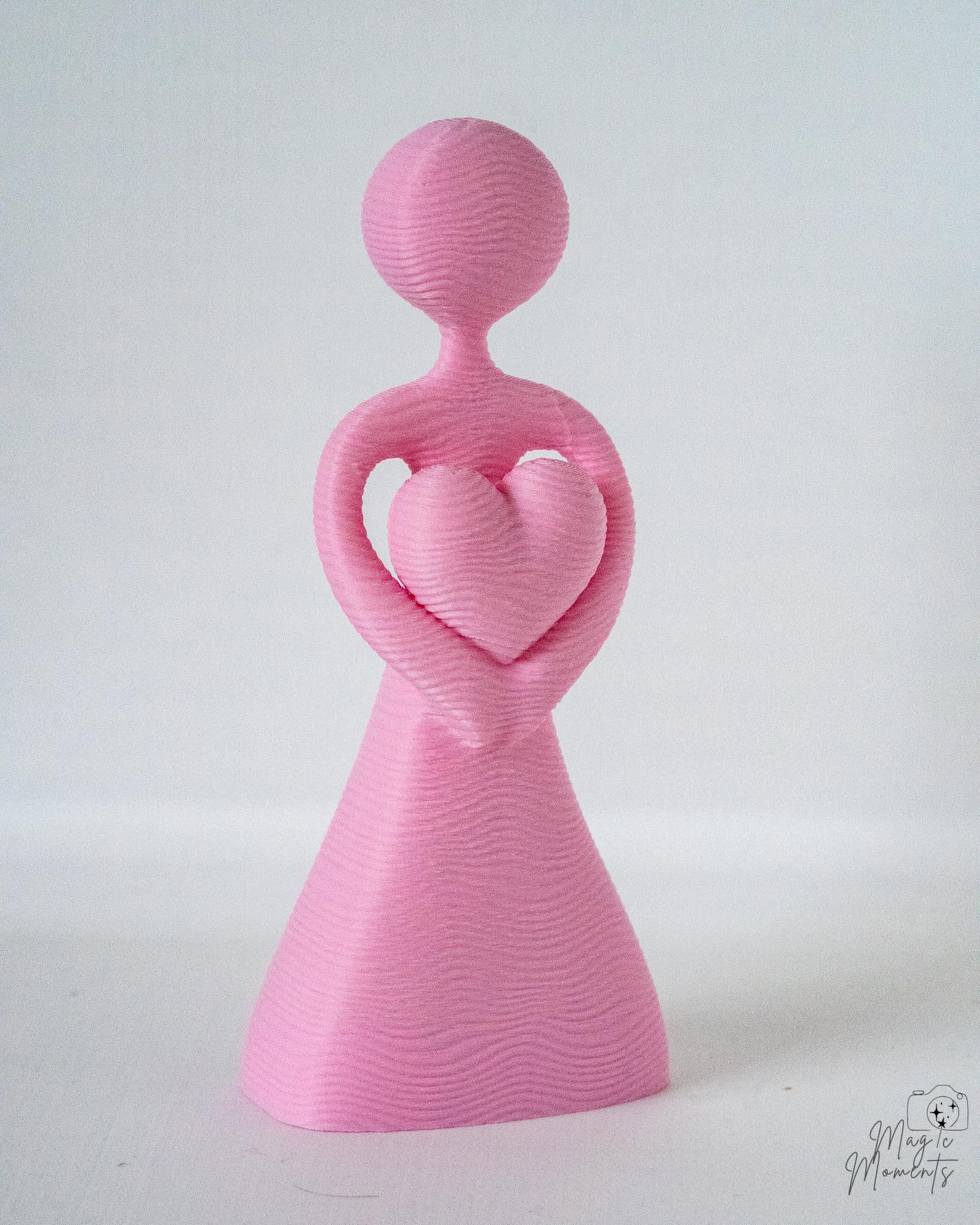 Pink minimalist couple figure with heart shaped detail