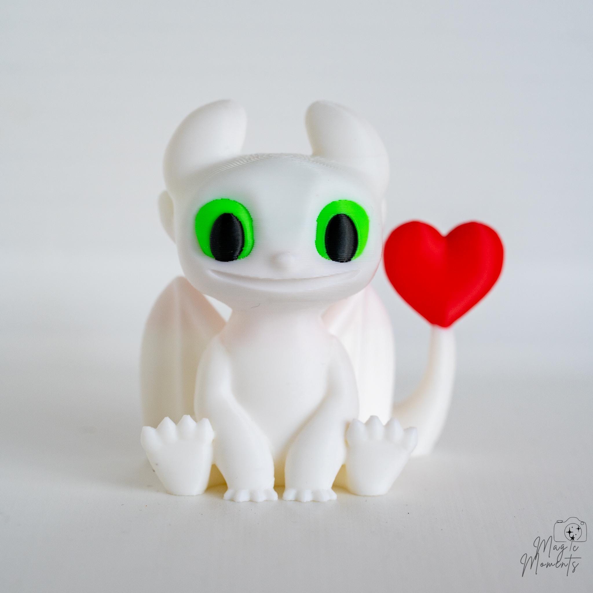 white dragon figurine with heart 3d printed fantasy decor