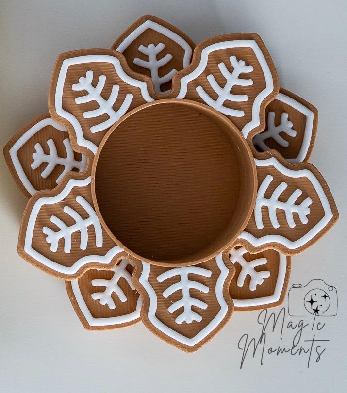 snowflake tealight holder with layered winter pattern detail