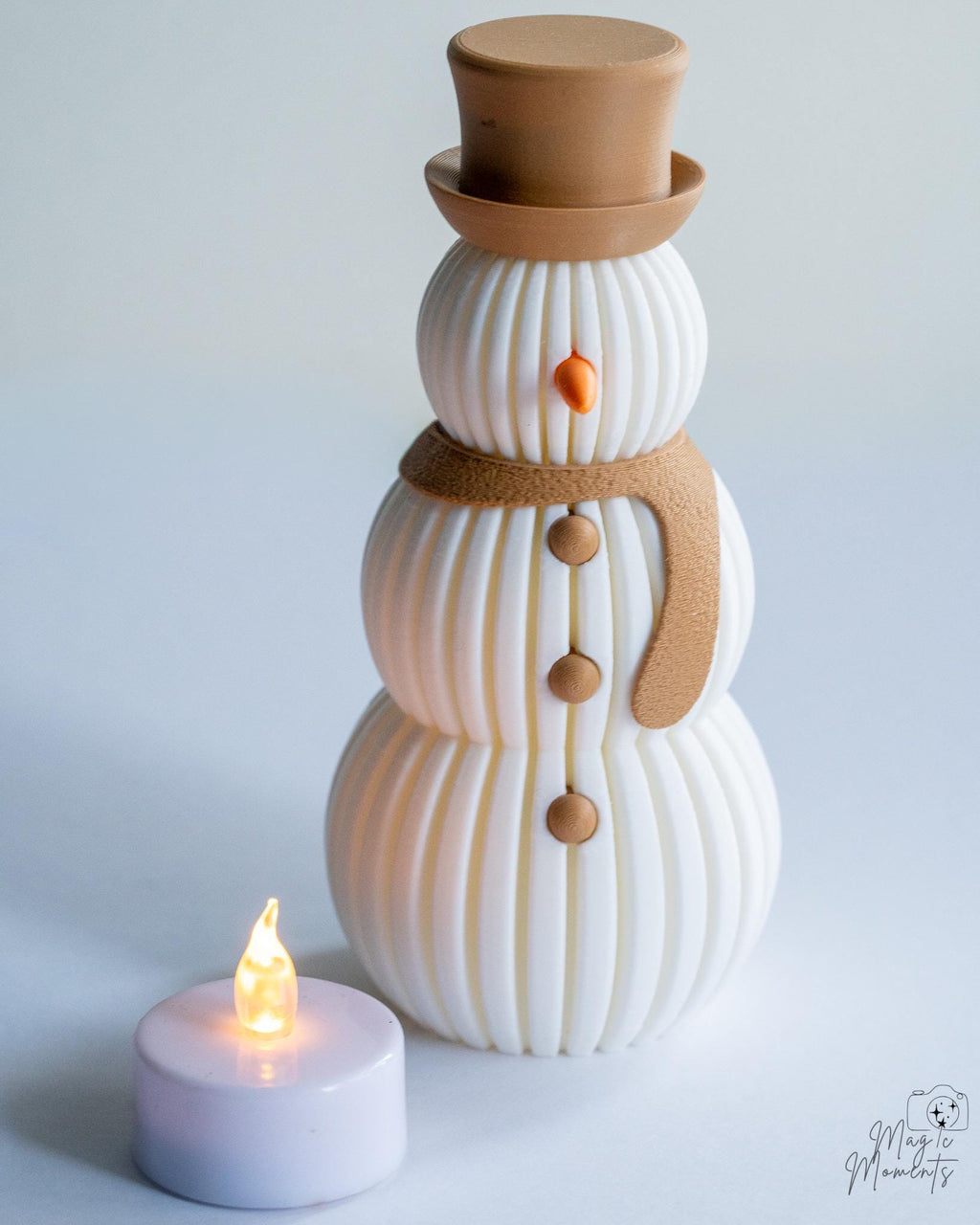 Snowman decoration with beige hat and minimalist ribbed texture