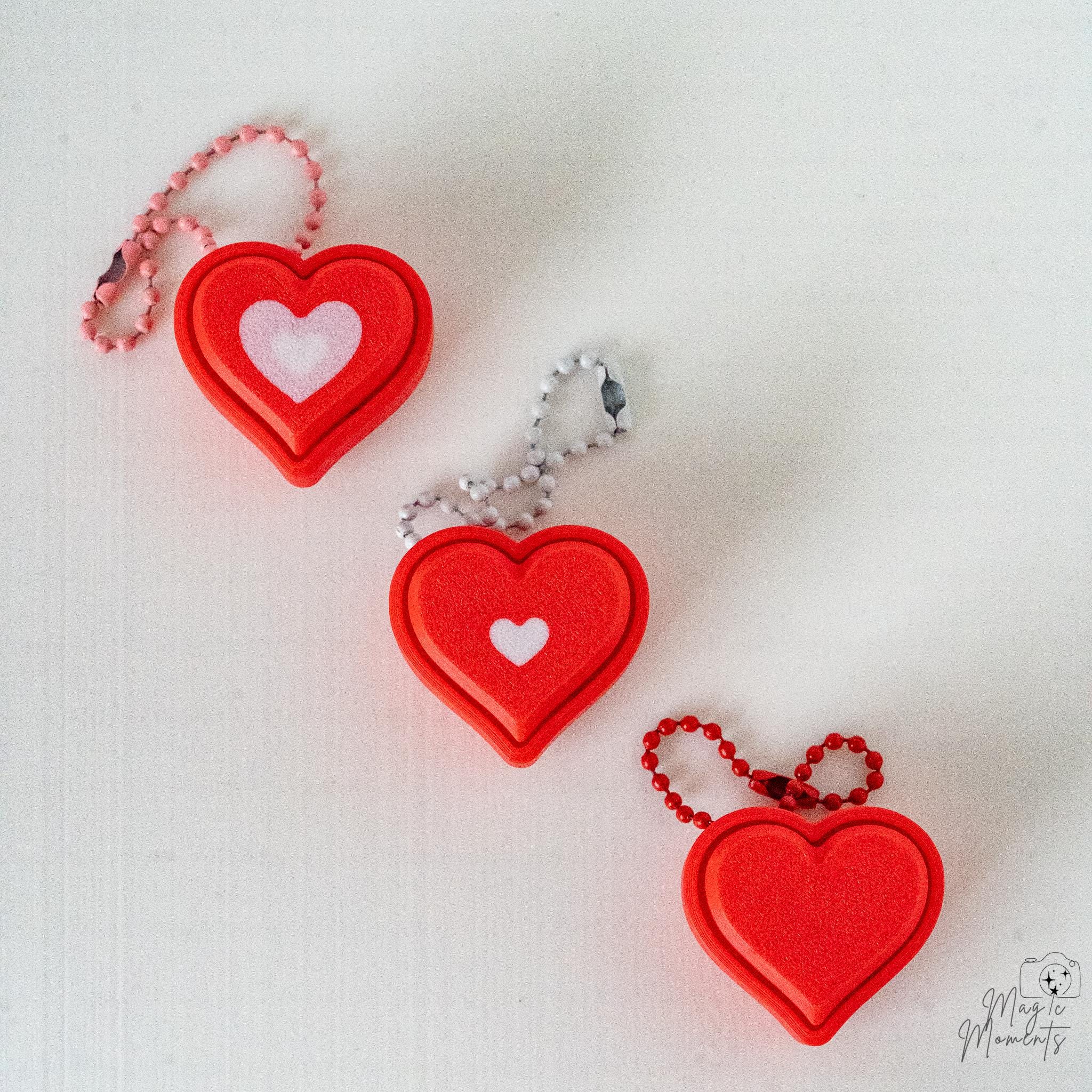Heart clicker keychains with colourful hanging loops