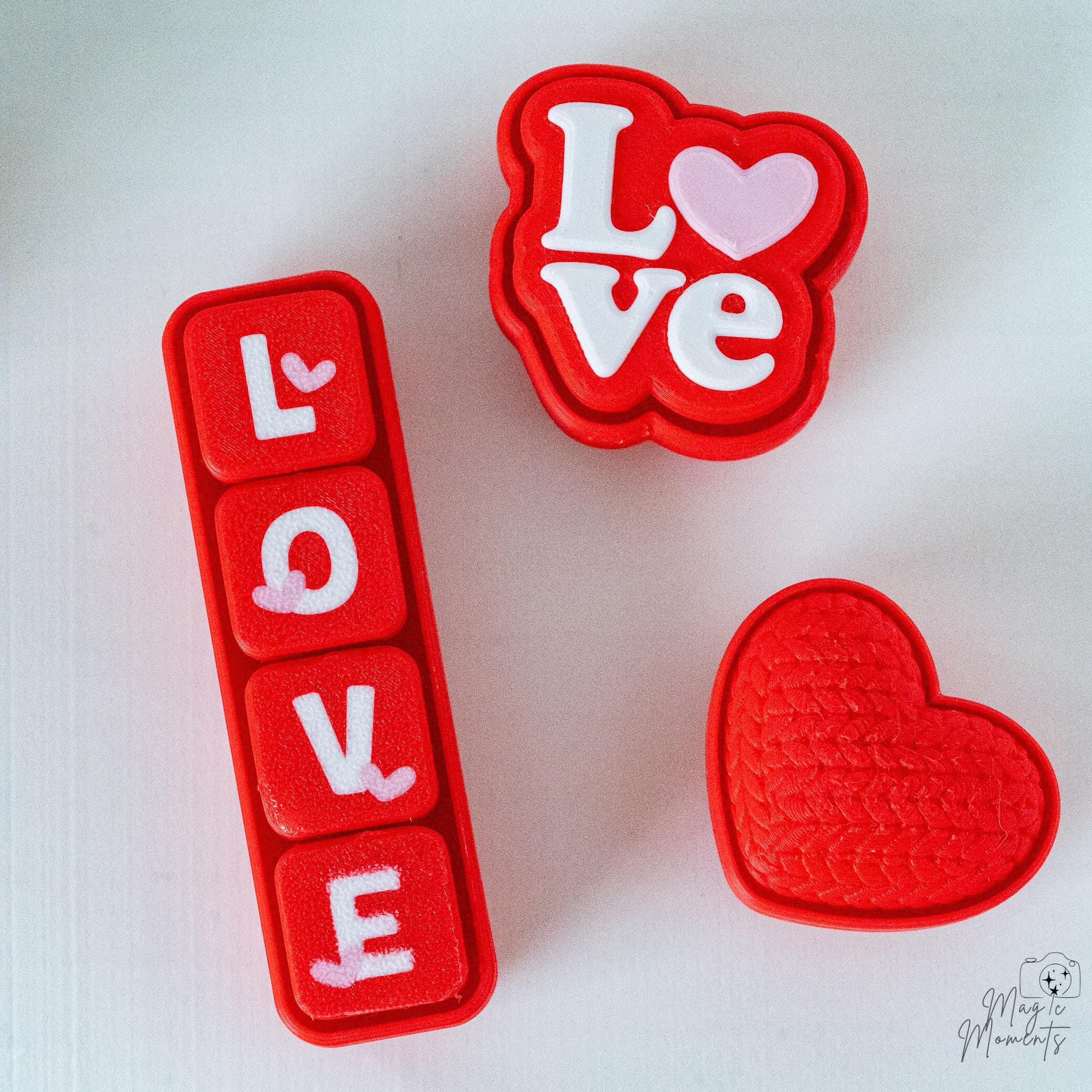 Matching Valentine clicker set with love text and heart shapes