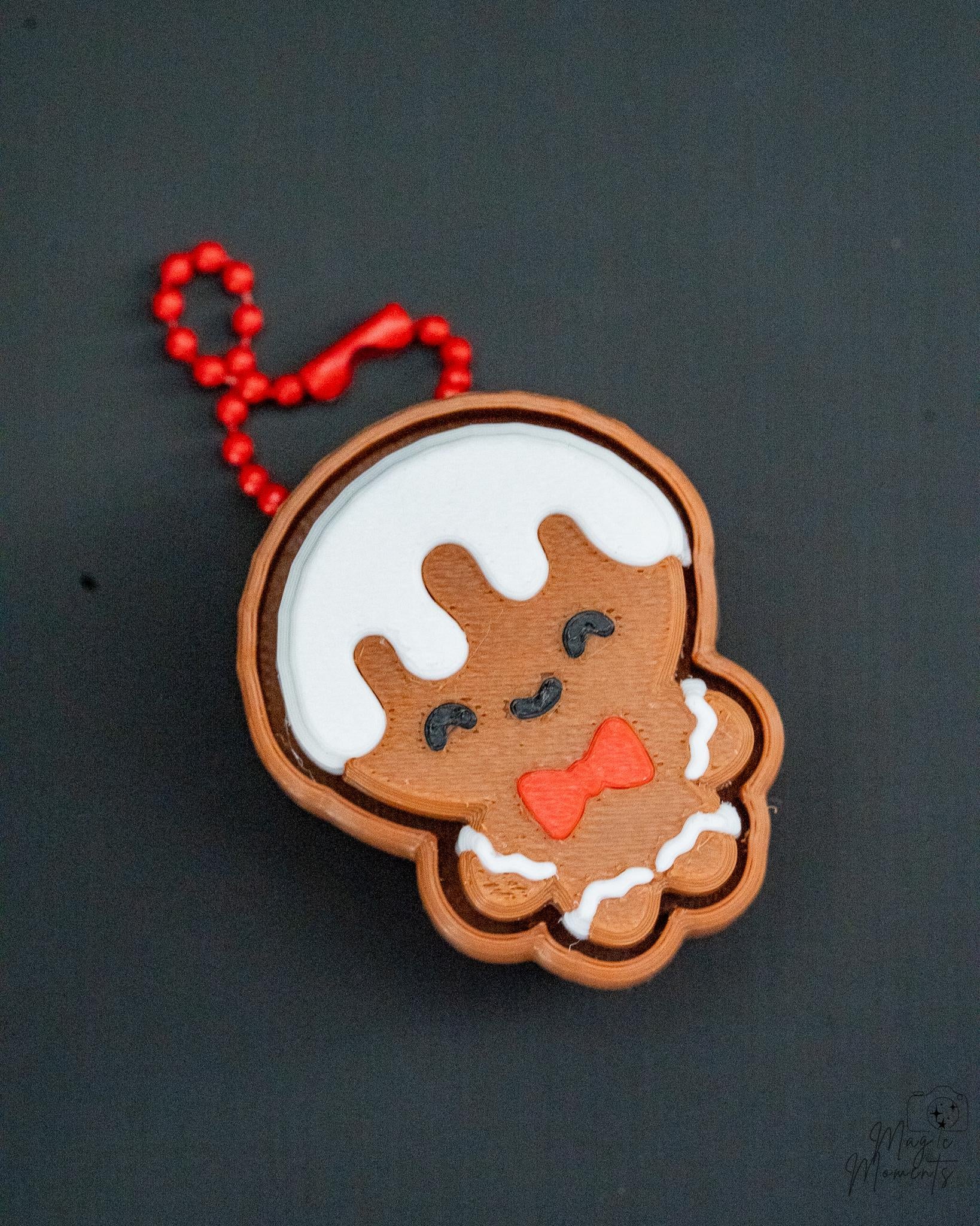 Gingerbread boy clicker with icing details keychain