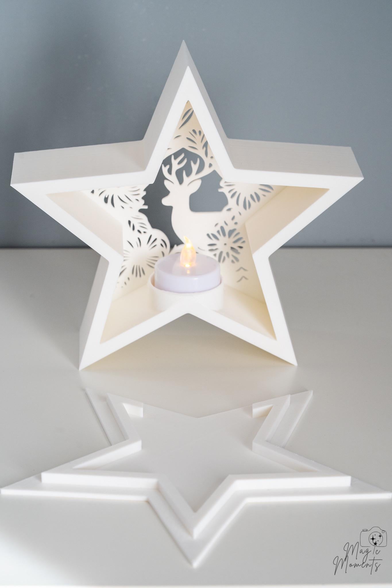 White star-shaped candle holder with cut-out design 
